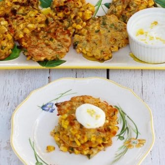 Corn & Basil Cakes Topped with Sauce