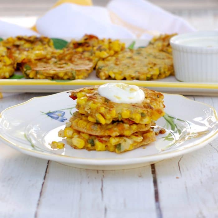 Corn & Basil Cakes Stacked on Plate