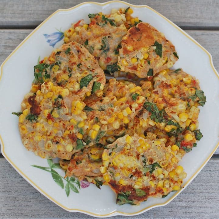 Savory corn & basil cakes are a great vegetarian side dish or main dish. Serve with a light and tangy Lemon Yogurt Sauce. Grill them during the summer or make them inside all year round! Get the vegetarian recipe @jlevinsonrd.