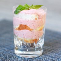 No-Bake Strawberry Mousse Parfaits are a light, fluffy, and delicious treat elegant enough for company and easy enough to make for yourself. Get the vegetarian, egg-free recipe @jlevinsonrd.