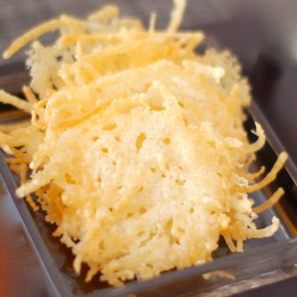 Quick and Easy Parmesan Crisps are a sophisticated hors d'oeuvres to serve at a cocktail party and a delicious accompaniment to a soup or salad. Get the two ingredient, gluten-free, vegetarian recipe @jlevinsonrd.
