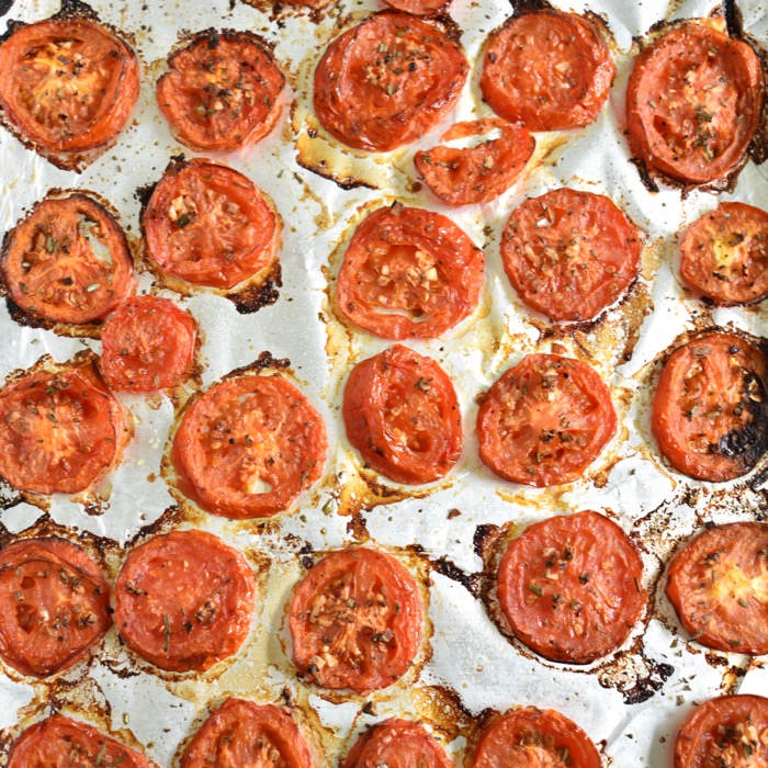 roasted tomatoes on baking sheet