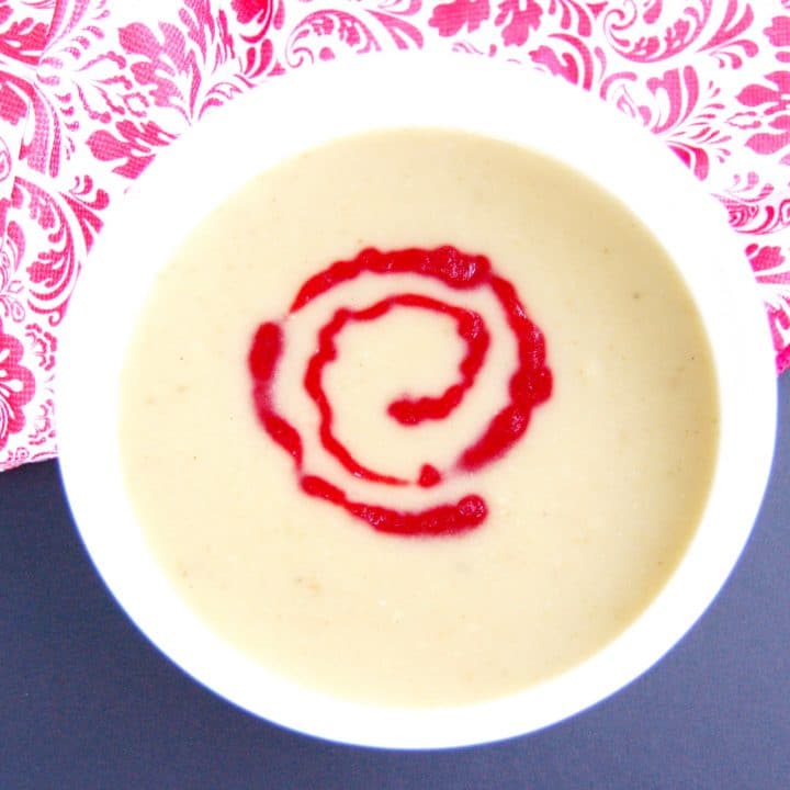 Parsnip pear soup is sweet, savory, and creamy without any cream. A delicious addition to a fall or winter meal. Tart cranberry coulis provides an elegant topping and flavorful contrast to the sweetness of the soup. Serve as an appetizer or in smaller servings as a festive holiday party hors d'oeuvre. Get this vegan and gluten-free recipe at Small Bites by Jessica.