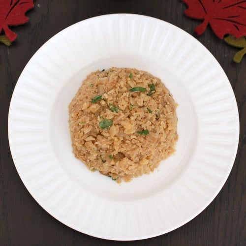 Crispy Cauliflower "Rice" vegetarian, grain-free side dish.