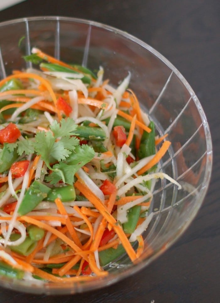 Close Up of Thai Citrus Salad in Clear Bowl