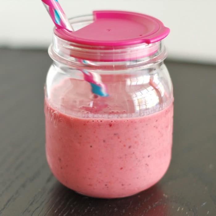 Mixed Berry Yogurt Smoothie in Glass with Straw