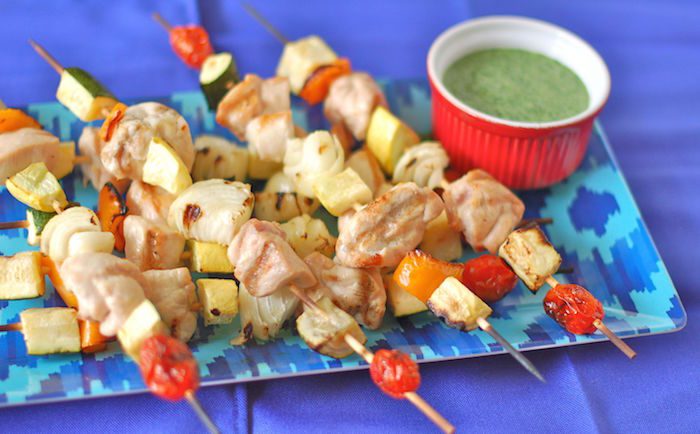 Veggie and protein-packed, these chicken kebabs with herb sauce are the perfect summer dinner on the grill! via JessicaLevinson.com | #glutenfree #dairyfree #chickenrecipes #kosher #grillingrecipes #summerrecipes #healthyrecipes