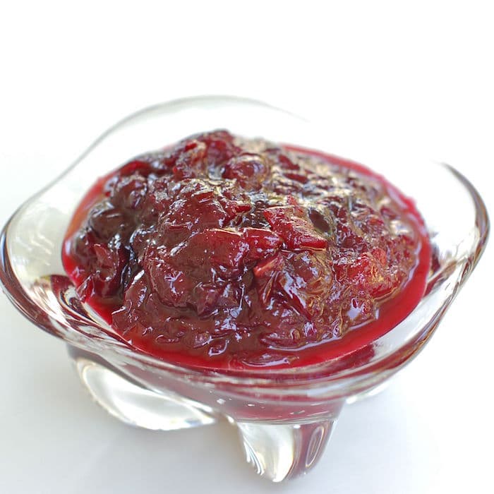 This Spicy Cherry Chutney is sweet and sour with a bit of a kick. The perfect condiment to serve at your summer barbecue! Get the recipe at JessicaLevinson.com | #cherries #cherryrecipes #chutney #condiments #lowersugar #sauces