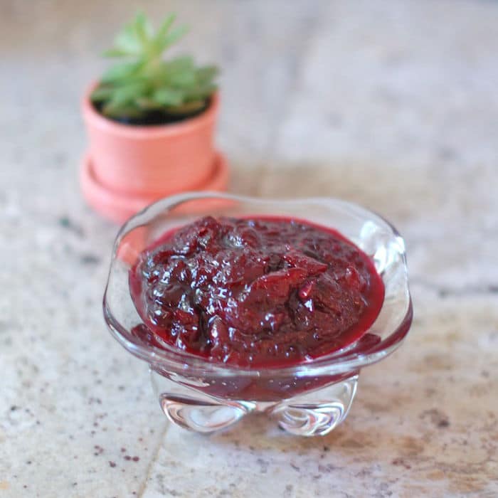 This Spicy Cherry Chutney is sweet and sour with a bit of a kick. The perfect condiment to serve at your summer barbecue! Get the recipe at JessicaLevinson.com | #cherries #cherryrecipes #chutney #condiments #lowersugar #sauces