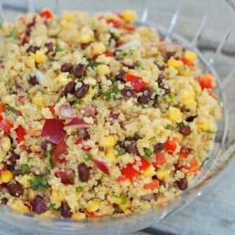 Close Up Corn and Black Bean Quinoa Salad in glass bowl