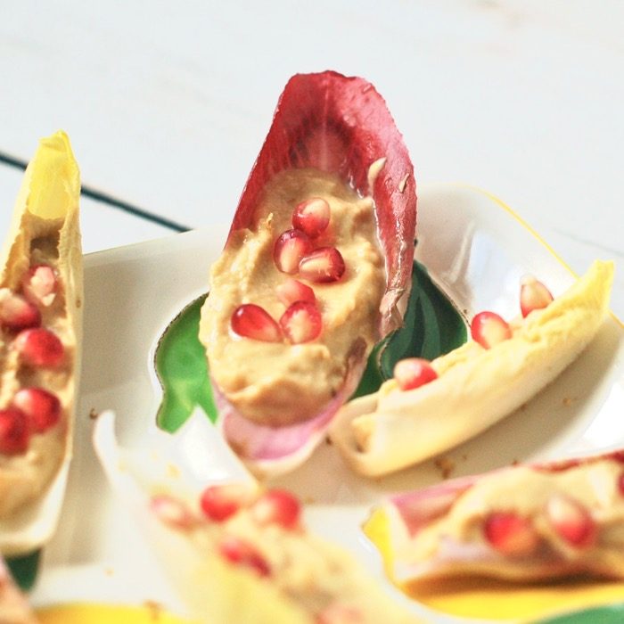 quick and easy appetizer for a crowd. lemon hummus endive boats