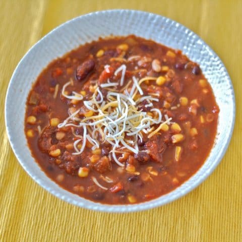 three bean vegan chili in white bowl