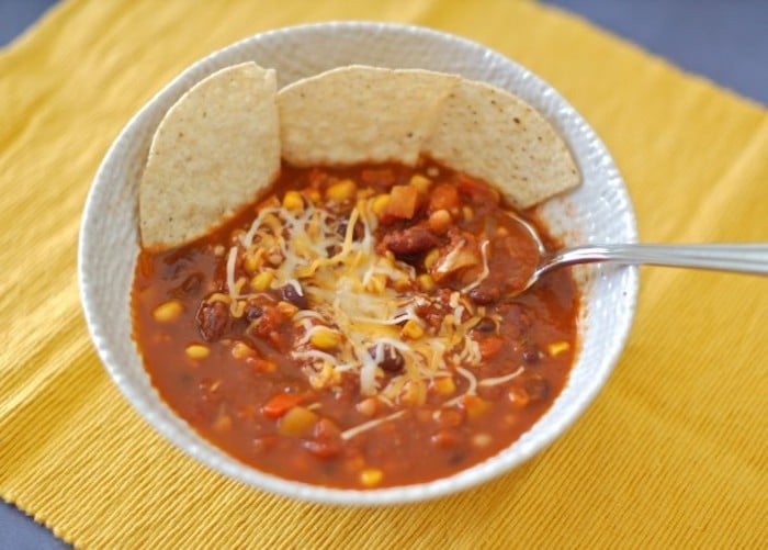 Three-Bean Vegetarian Chili Recipe in Bowl with Spoon