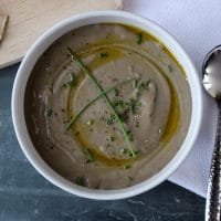 Satisfy your cravings for an umami-rich meal with this gluten-free and vegetarian thick and creamy pureed mushroom soup - no cream added! #mushroomsoup #mushroomrecipes #soup #glutenfree #vegetarian