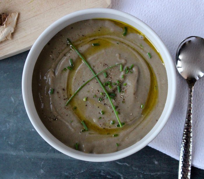Satisfy your cravings for an umami-rich meal with this gluten-free and vegetarian thick and creamy pureed mushroom soup - no cream added!| Get the recipe at JessicaLevinson.com. | #mushroomsoup #mushroomrecipes #souprecipes #MushroomADay