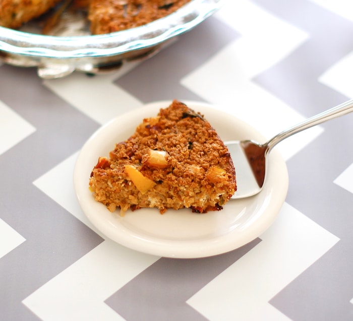 savory baked oatmeal with sun-dried tomatoes, spinach, and goat cheese