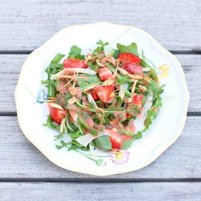 Strawberry Arugula Salad on White Plate