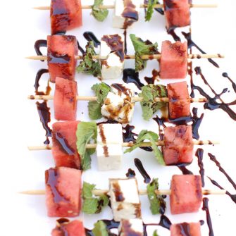 Watermelon, Feta, and Mint Skewers are an easy, healthy, and refreshing sweet and savory appetizer for a summer party. Get the gluten-free and vegetarian recipe @jlevinsonrd.