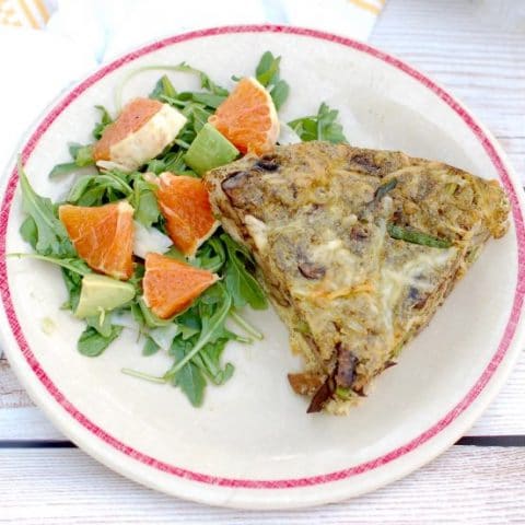 Savor the flavors of spring and summer with this Mushroom Asparagus Pesto Frittata. Perfect for a quick and easy weeknight dinner or a relaxing weekend brunch. Get the recipe at JessicaLevinson.com | #vegetarian #glutenfree #asparagus #eggrecipes #mushrooms #frittata #springrecipes