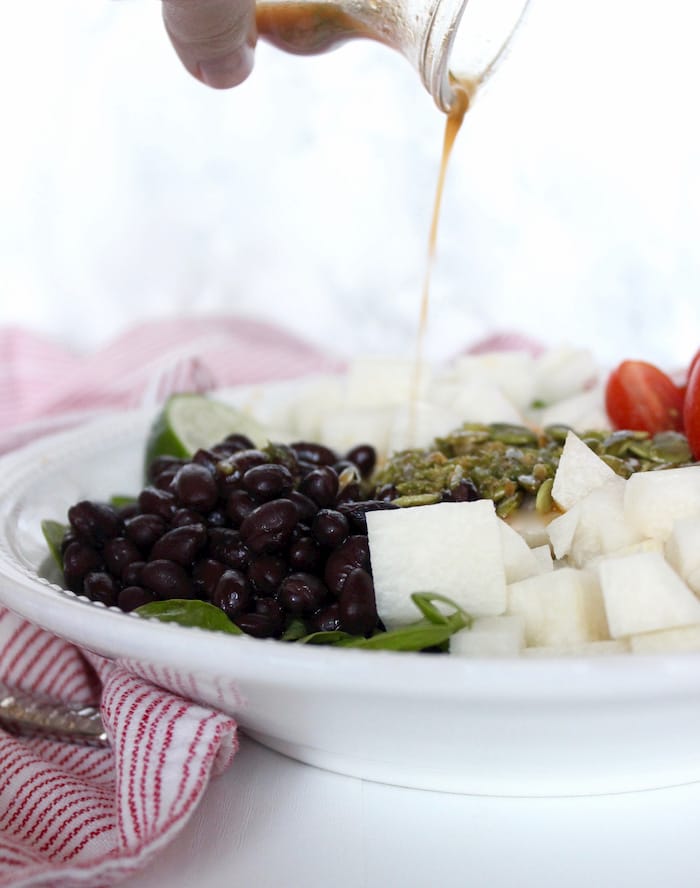 Spinach Salad with Jicama and Salad Dressing Pour