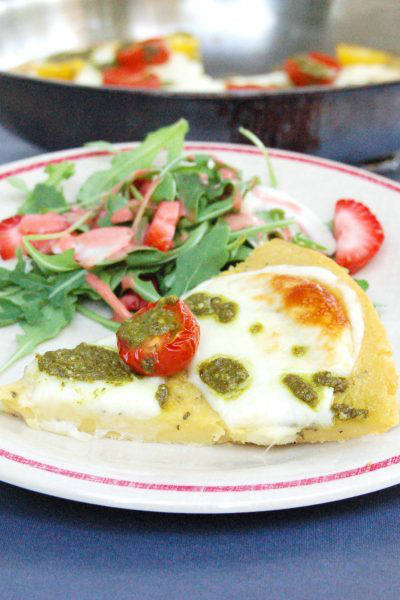 Farinata with Tomato Mozzarella and Pesto on Plate