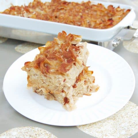 piece of cinnamon apple noodle kugel on a plate