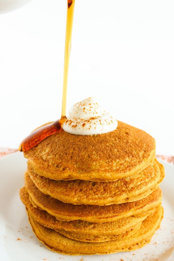 Healthier Pumpkin Pancakes with Syrup Pour