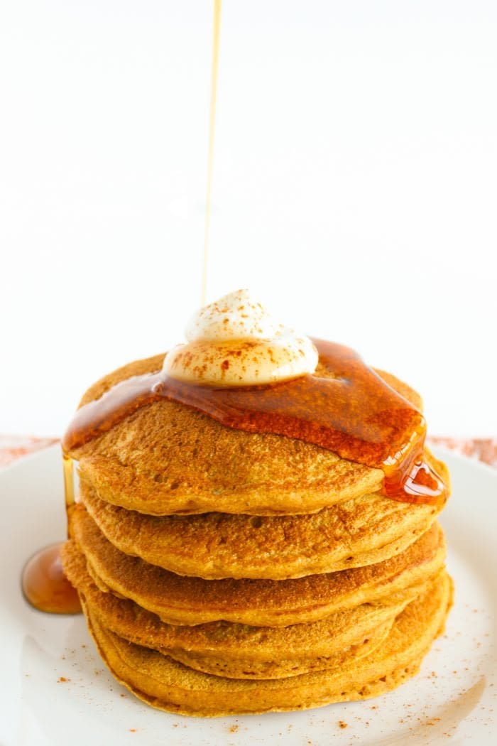 Healthier Pumpkin Pancakes with Syrup Drizzle