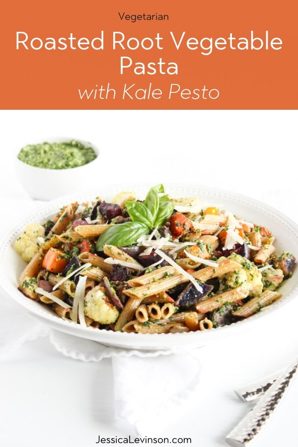 Roasted root vegetable pasta with pesto with title overlay