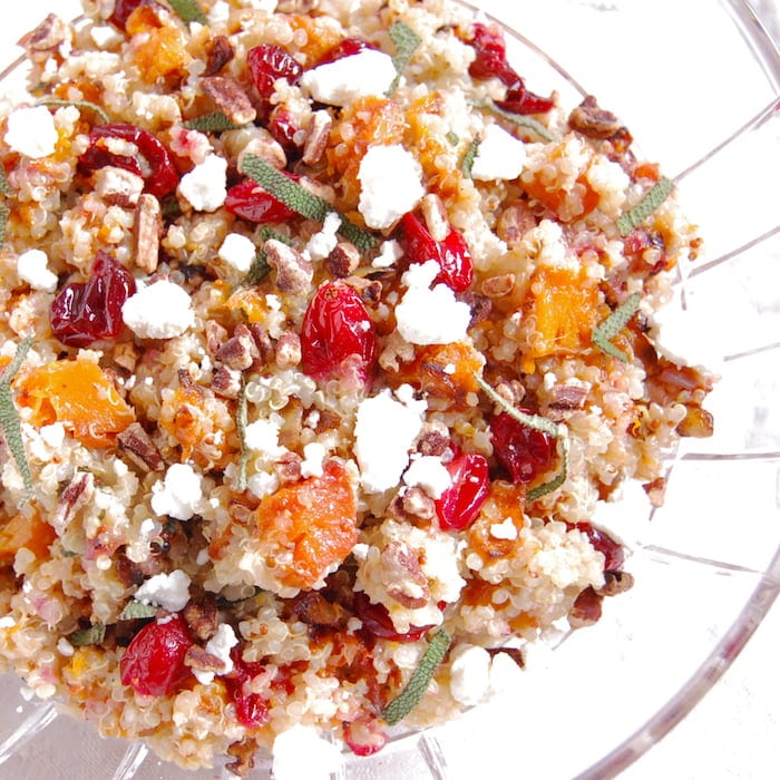 roasted butternut squash and cranberry quinoa salad topped with goat cheese and pecans for a protein boost