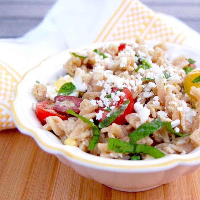 close up of pasta nicoise salad in bowl