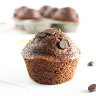 Delicious whole grain double chocolate muffins taste sinful but aren’t! A great make-ahead breakfast treat or healthier dessert. Vegetarian and nut-free.