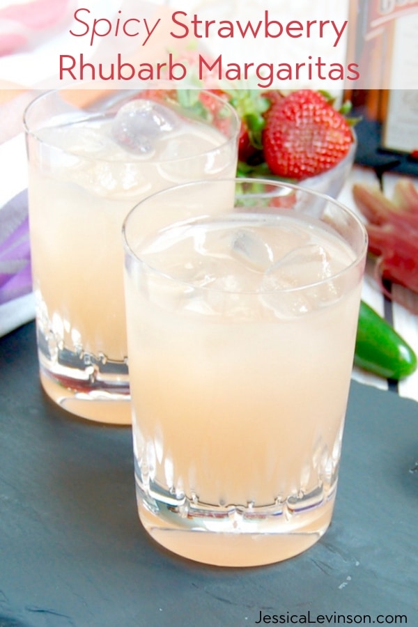 two glasses of spicy strawberry rhubarb margaritas