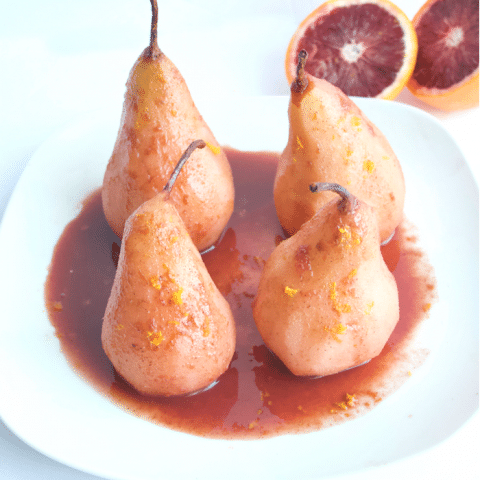 Blood Orange Poached Pears are made with only five simple ingredients, and no added sweeteners. A simple and elegant dessert for any occasion! #vegan #glutenfree #noaddedsugar