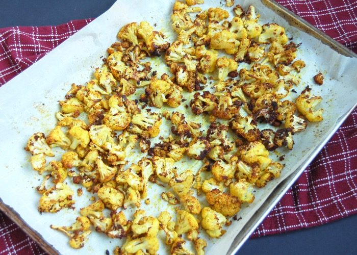 turmeric roasted cauliflower on baking sheet