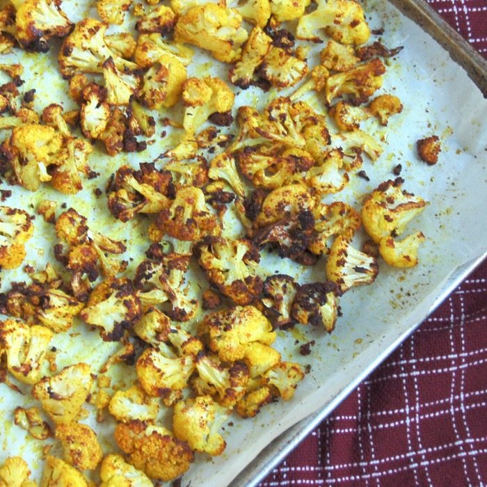 close up of roasted cauliflower with turmeric