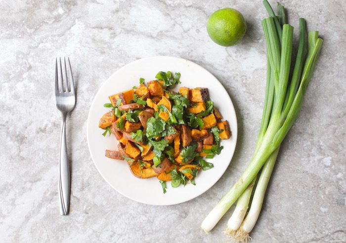 Roasted Sweet Potato Salad on Plate with Lime and Scallions