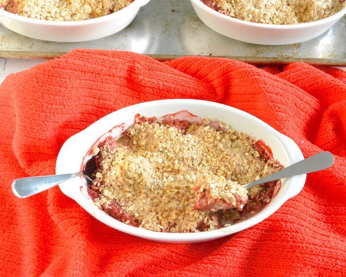 Strawberry Rhubarb Crisp in Dish with Two Spoons