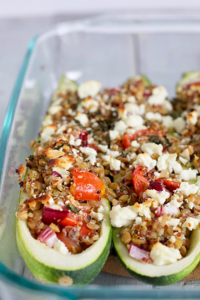 close up of stuffed zucchini boats