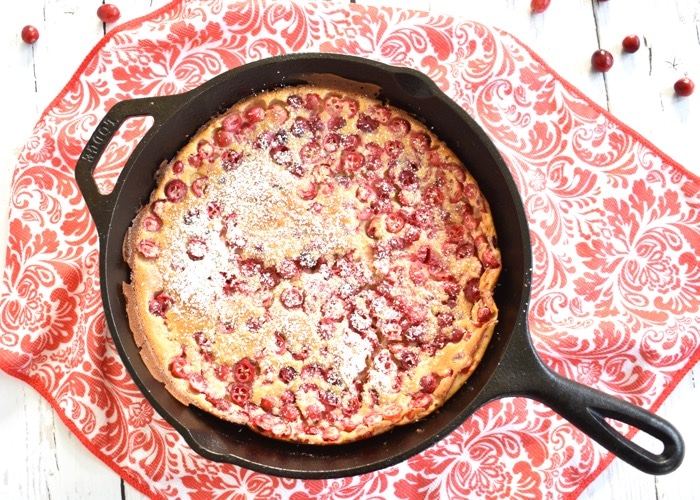 Cranberry Orange Dutch Baby in cast iron skillet