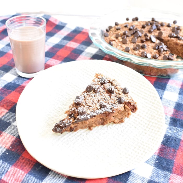 Baked Oatmeal with Berries and glass of chocolate almondmilk