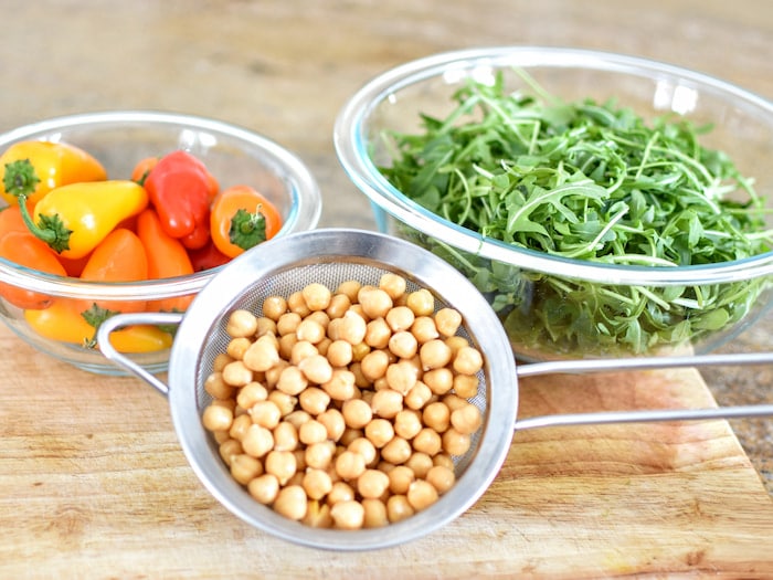 strained canned beans with peppers and lettuce